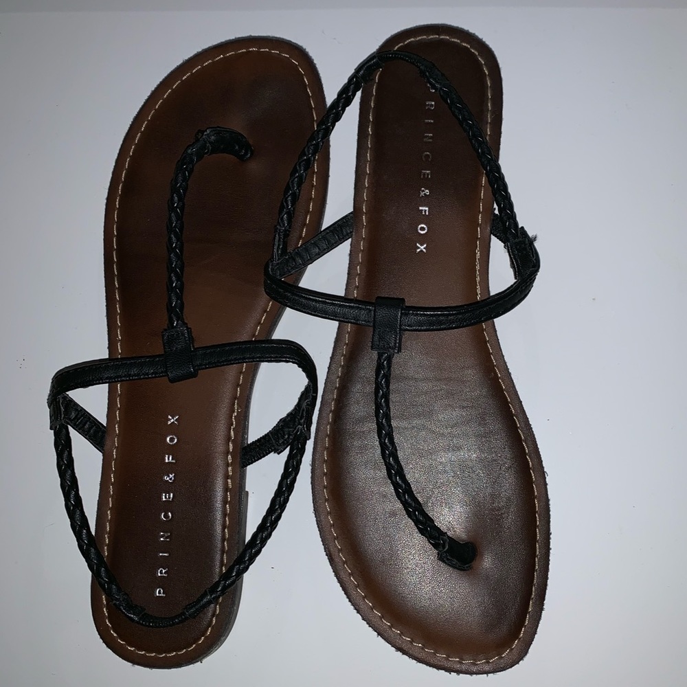 Black braided sandals with brown sole